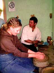 Student learning pottery
